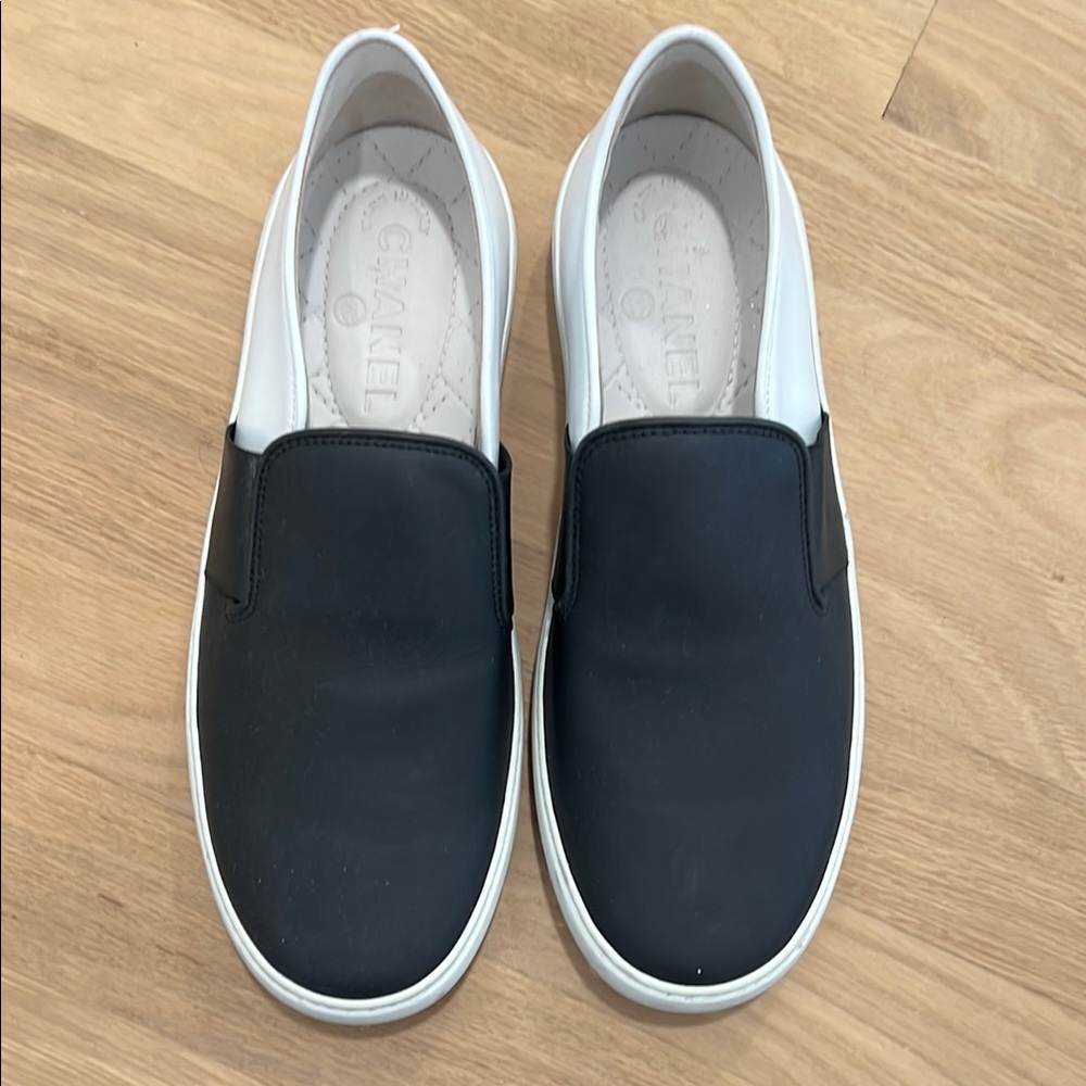 CHANEL Black and White Slip-On Shoes